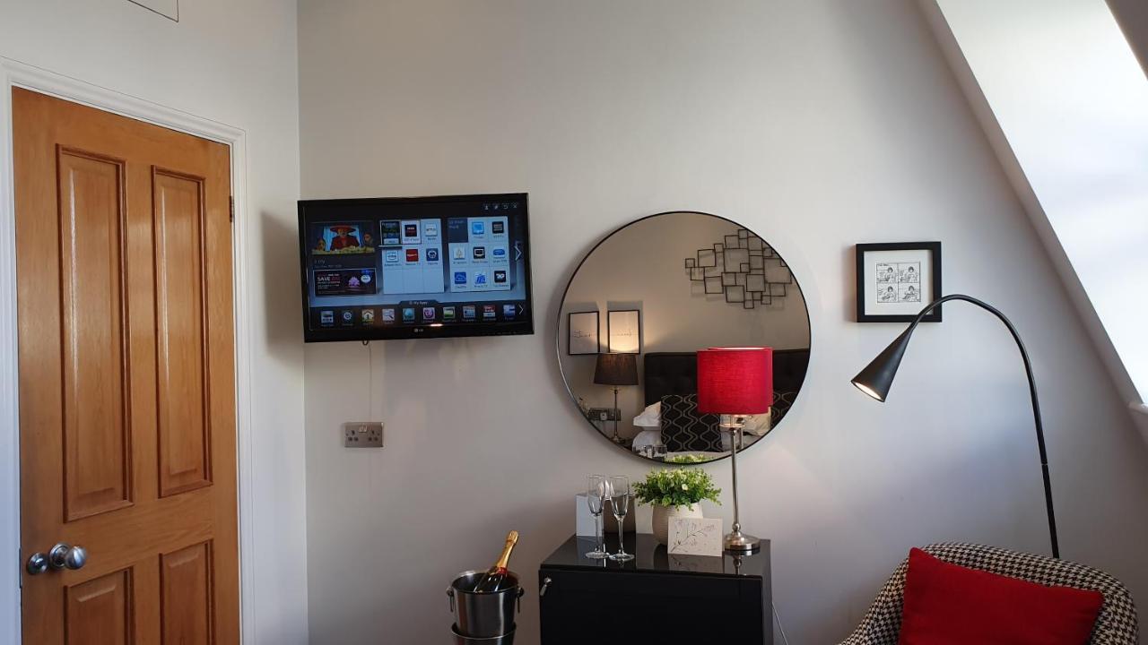 A Room With A View Brighton Exterior photo A television mounted on a wall